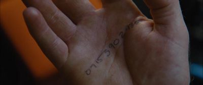 Still from Looper (2012) that has been tagged with: handwriting