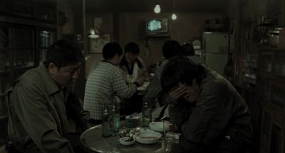 Still from Memories of Murder (2003) that has been tagged with: drinking