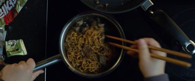 Still from Parasite (2019) that has been tagged with: food