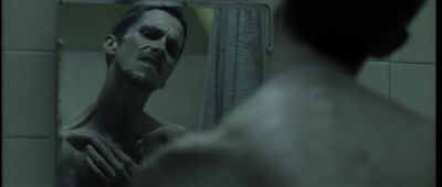 Still from The Machinist (2004) that has been tagged with: bathroom