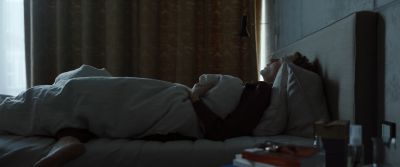 Still from Tár (2022) that has been tagged with: laying down