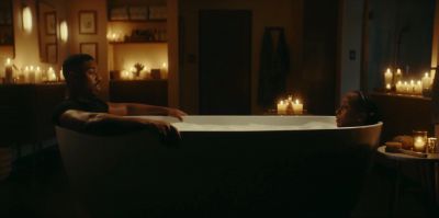 Still from Commercial: Amazon — "Alexa's Body" that has been tagged with: candles & candlelight