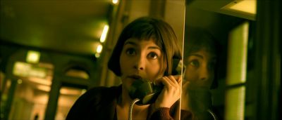 Still from Amelie (2001) that has been tagged with: dutch-angle & reflection