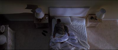 Still from American Beauty (1999) that has been tagged with: overhead & bed & day