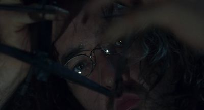 Still from Being John Malkovich (1999) that has been tagged with: extreme close-up & glasses