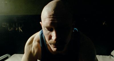 Still from Bronson (2008) that has been tagged with: prison cell & night