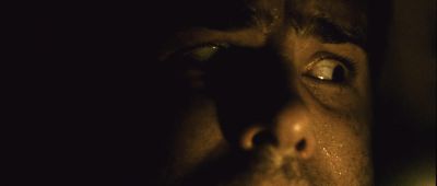 Still from Buried (2010) that has been tagged with: extreme close-up & eyes & night