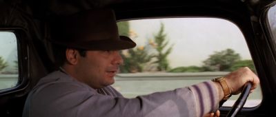 Still from Chinatown (1974) that has been tagged with: driving & profile shot & car interior