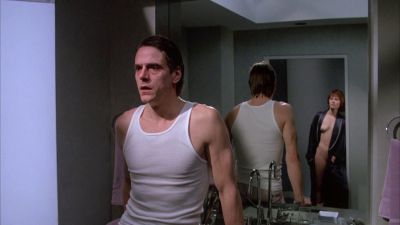 Still from Dead Ringers (1988) that has been tagged with: nudity & reflection