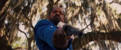 Still from Django Unchained (2012) that has been tagged with: gun & looking down & day