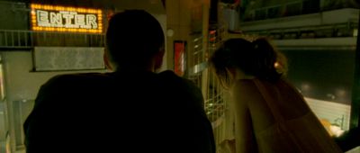 Still from Enter The Void (2009) that has been tagged with: over-the-shoulder