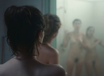 Still from Happening (2021) that has been tagged with: nudity & group-shot