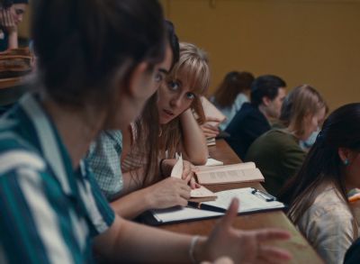 Still from Happening (2021) that has been tagged with: three-shot & classroom