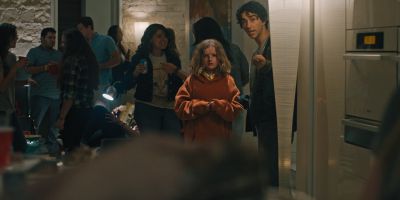 Still from Hereditary (2018) that has been tagged with: group-shot & night