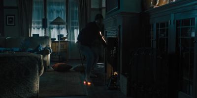 Still from Hereditary (2018) that has been tagged with: fire & fireplace