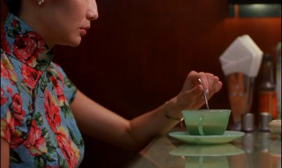 Still from In the Mood For Love (2000) that has been tagged with: restaurant & profile shot