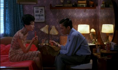 Still from In the Mood For Love (2000) that has been tagged with: bedroom & chopsticks