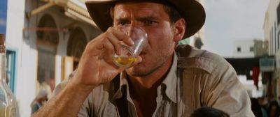 Still from Indiana Jones and the Raiders of the Lost Ark (1981) that has been tagged with: drinking