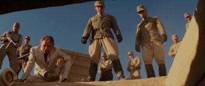 Still from Indiana Jones and the Raiders of the Lost Ark (1981) that has been tagged with: looking down & desert