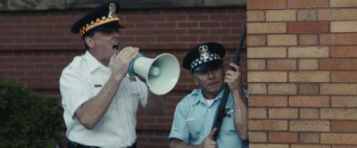 Still from Judas and the Black Messiah (2021) that has been tagged with: police & megaphone