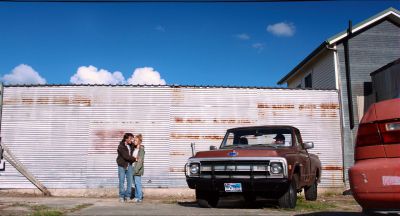 Still from Killer Joe (2011) that has been tagged with: group-shot & parking lot