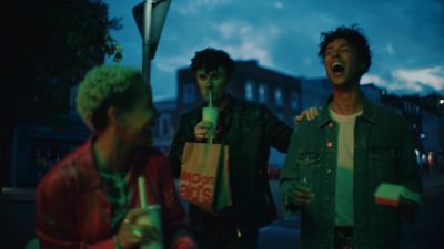 Still from Commercial: McDonald's — "Laughter" that has been tagged with: three-shot & laughing