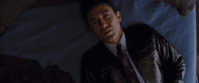 Still from Looper (2012) that has been tagged with: overhead & bed & day