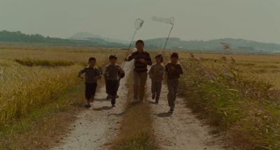 Still from Memories of Murder (2003) that has been tagged with: road & wide shot
