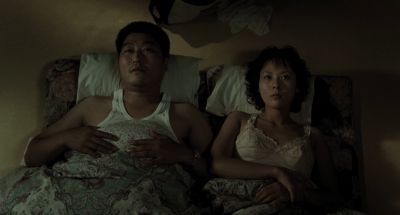 Still from Memories of Murder (2003) that has been tagged with: overhead & bed & floor
