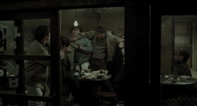 Still from Memories of Murder (2003) that has been tagged with: restaurant & exterior & medium wide