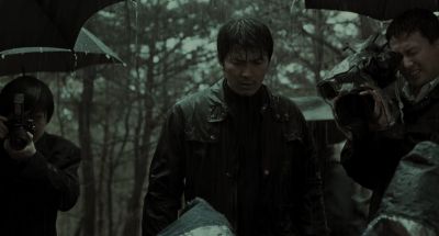 Still from Memories of Murder (2003) that has been tagged with: exterior & photographer