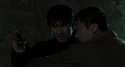 Still from Memories of Murder (2003) that has been tagged with: rain & exterior