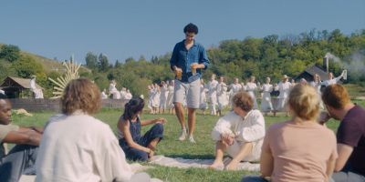 Still from Midsommar (2019) that has been tagged with: beer & group-shot