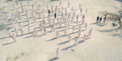 Still from Midsommar (2019) that has been tagged with: crowd & wide shot