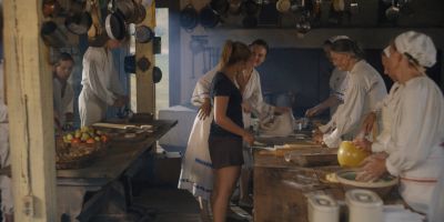 Still from Midsommar (2019) that has been tagged with: cooking & profile shot
