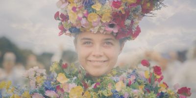 Still from Midsommar (2019) that has been tagged with: exterior & smiling