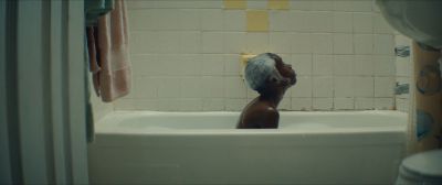 Still from Moonlight (2016) that has been tagged with: bathroom & medium wide