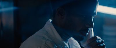 Still from Moonlight (2016) that has been tagged with: phone & fluorescent light