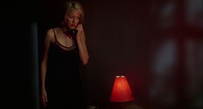 Still from Mulholland Drive (2001) that has been tagged with: phone & medium wide