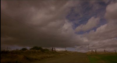 Still from My Own Private Idaho (1991) that has been tagged with: establishing shot & road