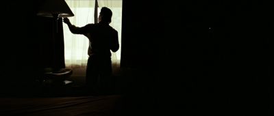 Still from No Country For Old Men (2007) that has been tagged with: over-the-shoulder & silhouette