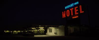 Still from Nocturnal Animals (2016) that has been tagged with: sign & motel exterior