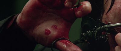 Still from Oldboy (2003) that has been tagged with: extreme close-up & blood