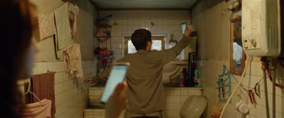 Still from Parasite (2019) that has been tagged with: bathroom & medium wide