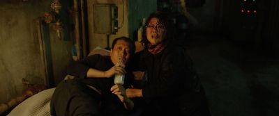 Still from Parasite (2019) that has been tagged with: drinking & high-angle