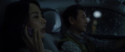 Still from Parasite (2019) that has been tagged with: driving & profile shot & night