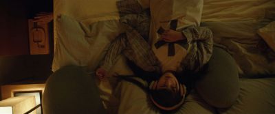 Still from Parasite (2019) that has been tagged with: laying down & bed & clean single