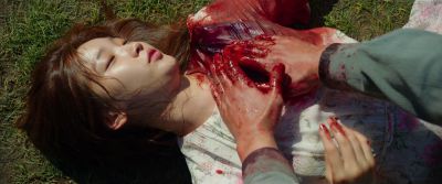 Still from Parasite (2019) that has been tagged with: gore & laying down