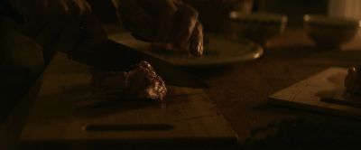 Still from Pig (2021) that has been tagged with: cooking & meat