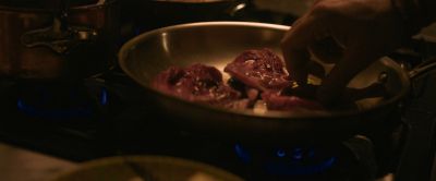 Still from Pig (2021) that has been tagged with: cooking & meat